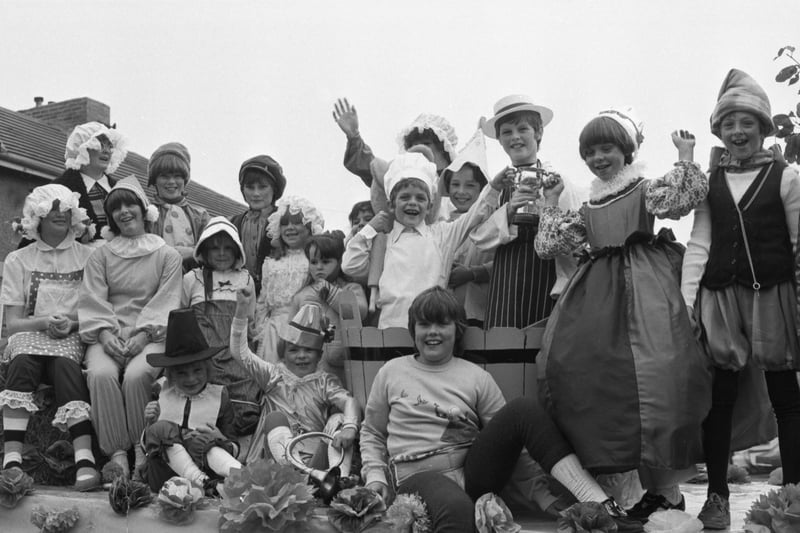 Children on the Durham Road Residents float won the cup for the most professional float in 1981. They won it with a nursery rhyme theme.