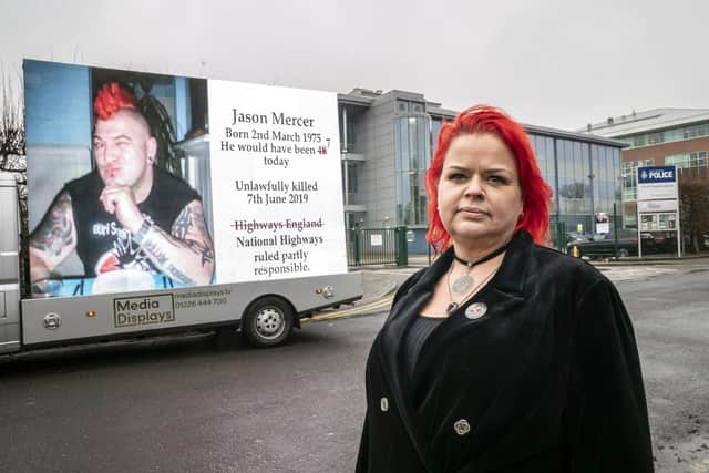 Claire Mercer, whose husband Jason was killed along with Alexandru Murgeanu when they were both hit by a lorry after stopping on a section of smart motorway on the M1 near Sheffield following a minor collision, campaigns outside South Yorkshire Police HQ in Sheffield, to mark the third anniversary of her husband's death. Photo: Danny Lawson/PA Wire