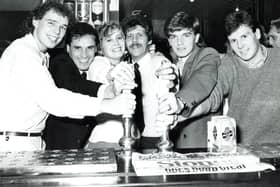 Pulling the first pints at the official re-opening of the Arbourthorne Hotel by Sheffield Wednesday and United players - left to right, Mel Sterland, Gary Shelton (SW), Josie and Terry Fisher (landlady and landlord), Charlie Williamson (SW) and Russell Black (SU), 1984