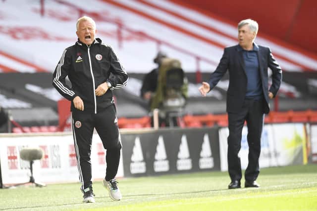 SHEFFIELD, ENGLAND - JULY 20: Chris Wilder (L), the manager of Sheffield United, and his opposite number Carlo Ancelotti during Monday's Premier League fixture at Bramall Lane: Peter Powell/Pool via Getty Images