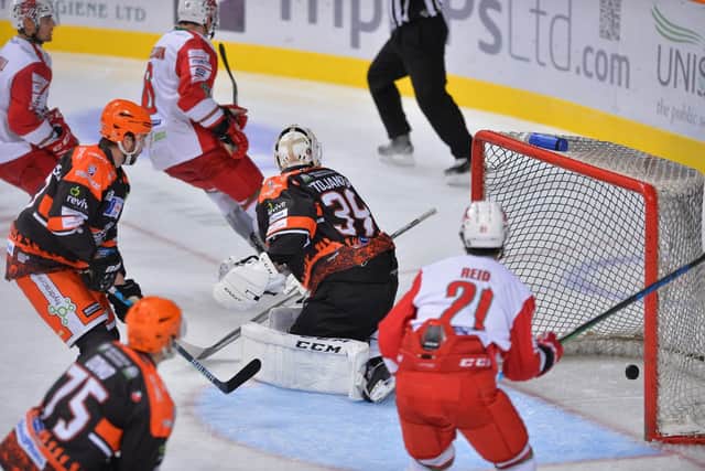 Three Cardiff players home in on Steelers net for a Devils goal. Pic Dean Woolley