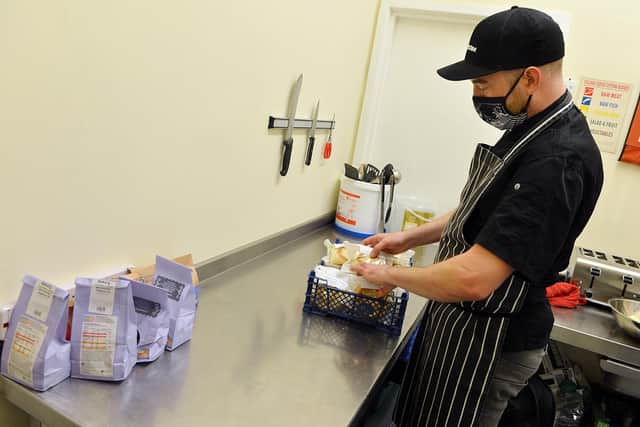 New home for Ben's Centre in Sheffield. Chef Rob Yeomans preparing food. 
