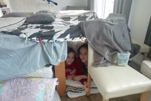 Build a den with duvets and blankets - and don't forget a torch!