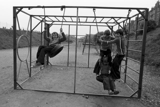 Children in an adventure playground where the tyre swings were always popular.