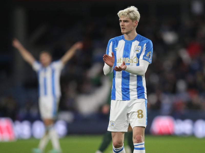 Former AFC Wimbledon midfielder has two years to run on his Huddersfield contract after their relegation to League One.