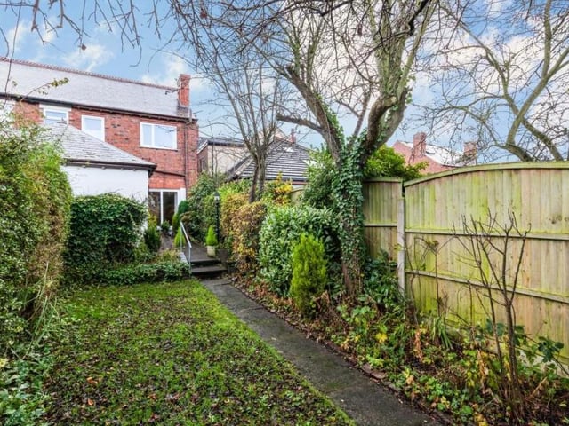 Moving outside now. and here is the back garden, which is a decent size and includes a patio area.