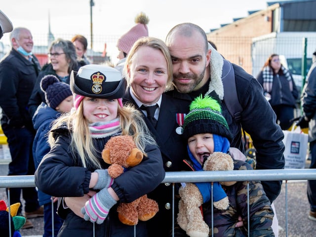 Jenni Smith with James, Evelyn 7 and Matthew 5 as she steps of HMS Defender. Picture: Habibur Rahman