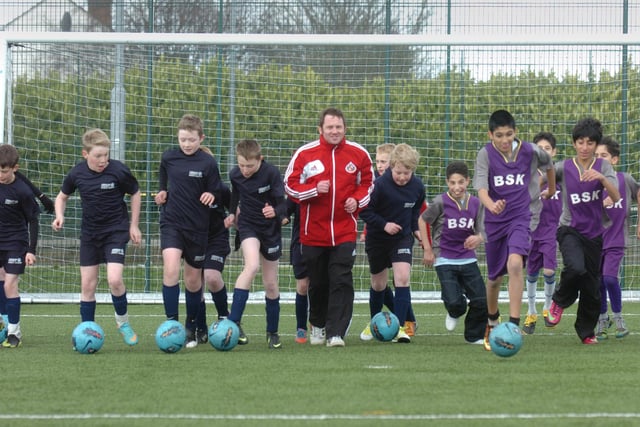 Giles Sandercock, centre, Football Delivery Manager for the Sunderland AFC Foundation of Light, was pictured with youngsters from the International School of Kuwait and the Farringdon Sports College feeder schools at their coaching session seven years ago. Have you spotted someone you know?