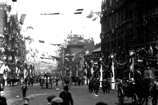 Flags in Fargate for what appears to be a royal visit in the 1880s.