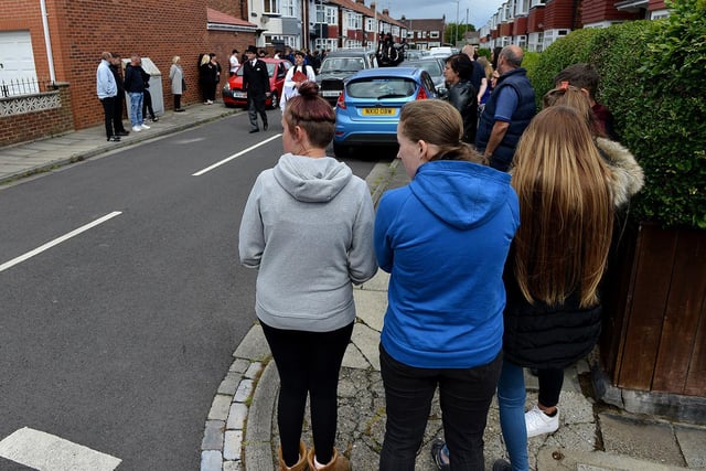 Many people gathered in Benji's street ready for the funeral cortege to leave for Stranton Cemetery. Picture by FRANK REID