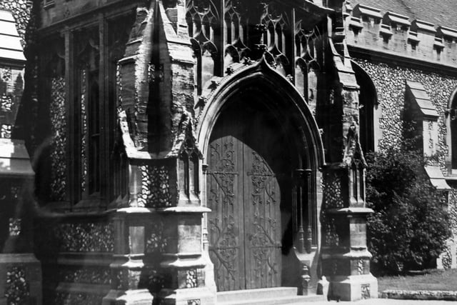 Detail of one of the entrance doors. St Marys Church Fratton Portsmouth south porch June 1955