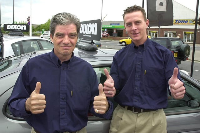 Dixon Nissan sales staff Bobby and Paul pictured outside the North Bridge Road dealership  in 2001