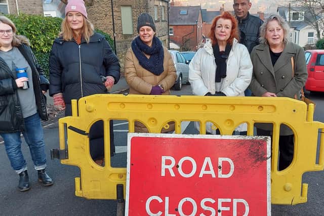 Residents blocked off the road for more than three hours on Friday morning, in protest of speeding drivers and parking issues.