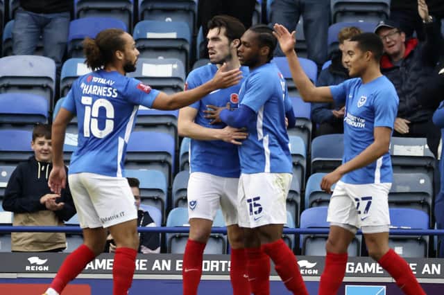 Pompey celebrate Marcus Harness' first-half opener.  Picture: Barry Zee