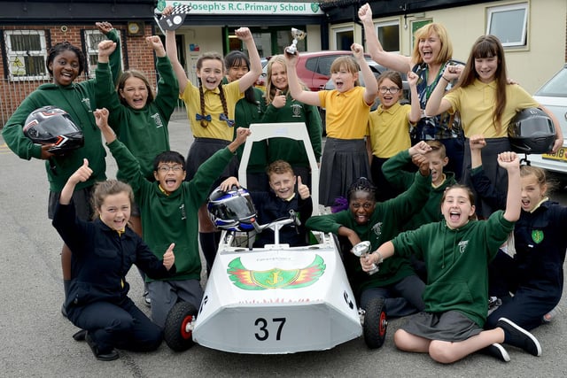 St Josephs pupils are pictured with science co-ordinator Tracy O'shea and the car they designed built and drove at Croft. Were you a part of this great project in 2018?