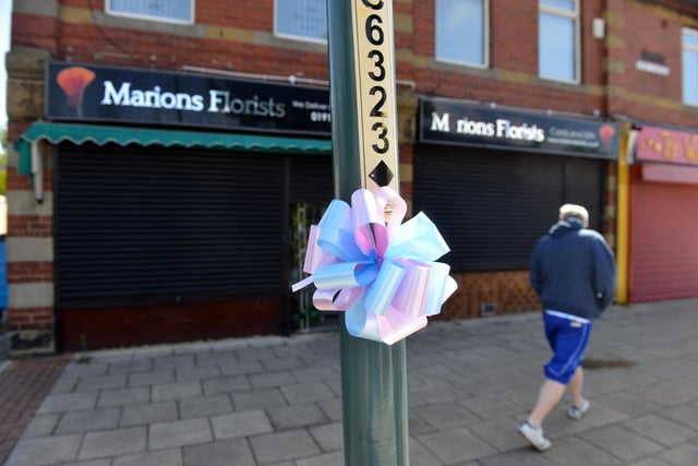 Pink and blue ribbons were left outside of Marions Florists at The Nook in South Shields.