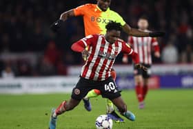 Keinan Davis of Nottingham Forest fouls Femi Seriki of Sheffield United during the Sky Bet Championship match at Bramall Lane, Sheffield. Picture credit should read: Darren Staples / Sportimage