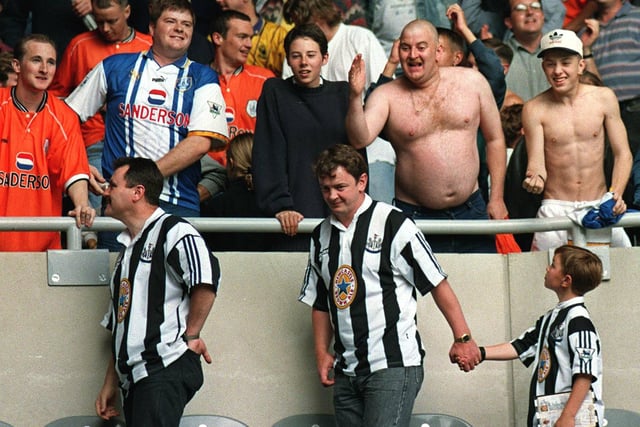 Sheffield Wednesday fans taunt Newcastle United supporters after their side defeated Newcastle two goals to one in the Premiership to stay top of the table in 1996. Photo John Giles.PA.