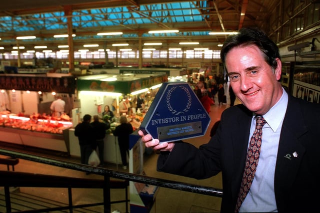 Jack Christopher was retiring as Sheffield City Council Markets Director in 1998 and is pictured in the Castle Market with his Investor in People Awrad