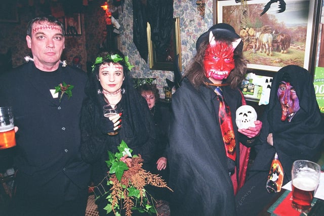 Pictured at the Robin Hood Pub, Little Matlock, Stannington, where the traditional Cakin  Neet was held . Seen at the bar are,Frankinstien and Bride Dave and Janet Lewis, Simon as the Devil and a witch in 1999