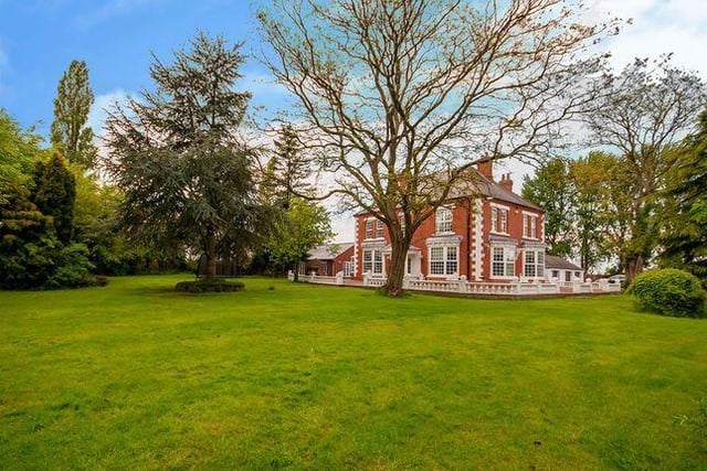 This seven-bed country residence with 10 acres of land has an indoor swimming pool.