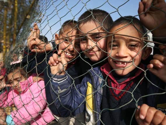 Syrian refugee children (Photo: PA)