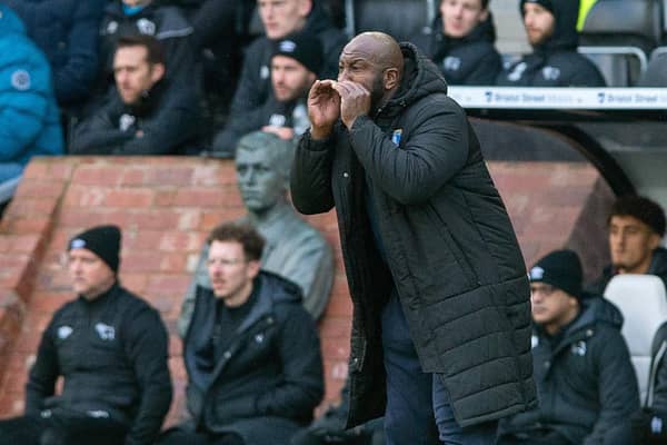 Darren Moore says players now want to stay at Sheffield Wednesday.