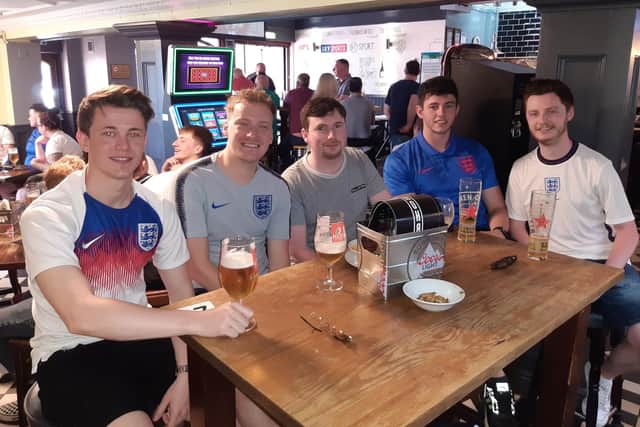 England fans at The Clubhouse pub in Sheffield. Pictured left to right are Shaun Austin, Aaron Thorpe, Lewis Bridges, Ryan Bellamy and Jack Scrimshaw