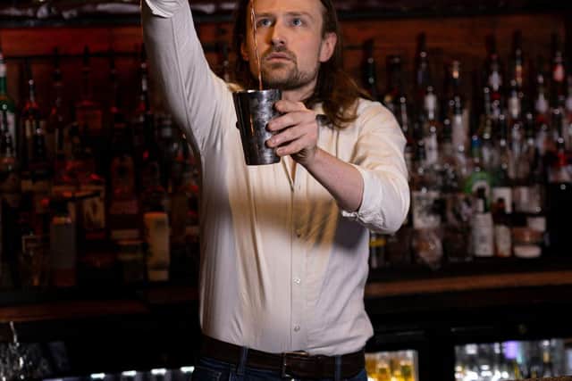 Cubana bartender Connor making one of Cubana’s renowned cocktails.