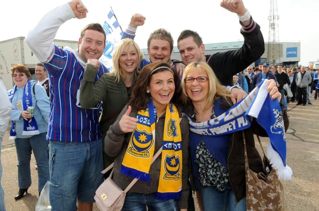 Chris Turner, Zoe Smith, Luke Swallow, Darren Good, and front Jackie Swallow and her daughter Jasmine board the bus for Wembley at Fratton Park..