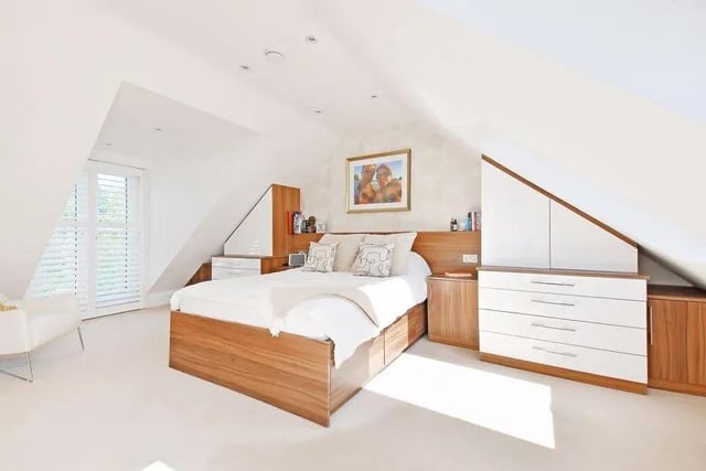 Stairs rise to the second floor, where a full loft conversion was completed in 2012 with Building Regulation approval. It has created a super master bedroom.