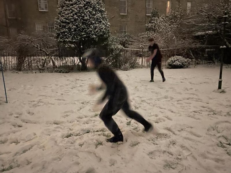 A snowball fight in Edinburgh last night.