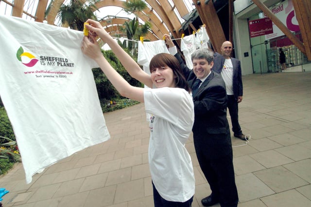 Volunteer Katie Steels, Coun Andrew Sangar and Mark Daly of Sheffield is my Planet hang out the washing in the Winter Garden as part of International Clothes Line Week in 2010