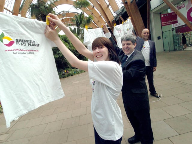 Volunteer Katie Steels, Coun Andrew Sangar and Mark Daly of Sheffield is my Planet hang out the washing in the Winter Garden as part of International Clothes Line Week in 2010