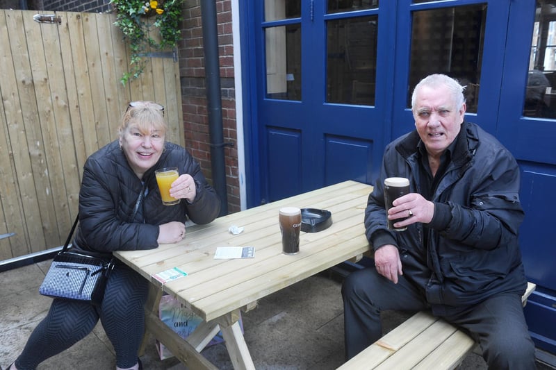 Helen Clarke and Albert Chivers both from Portsmouth, enjoy an orange and lemonade and a pint of Guinness at The Parchment Makers in Park Road South, Havant. Picture: Sarah Standing (120421-6485)