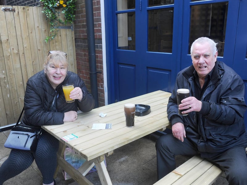 Helen Clarke and Albert Chivers both from Portsmouth, enjoy an orange and lemonade and a pint of Guinness at The Parchment Makers in Park Road South, Havant. Picture: Sarah Standing (120421-6485)