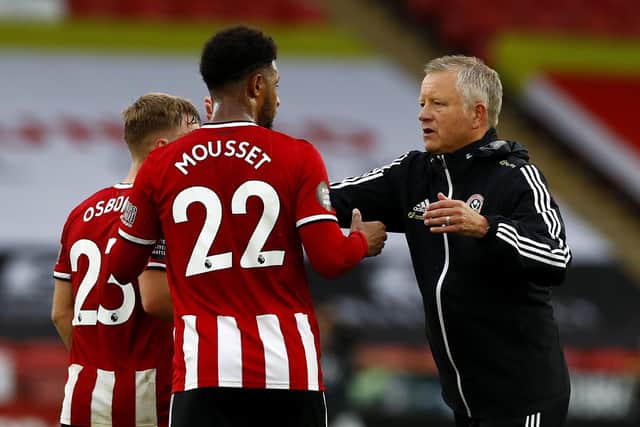 Sheffield United manager Chris Wilder (right) and Lys Mousset react after the Premier League match at Bramall Lane.