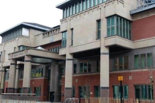 Sheffield Crown Court, pictured, has heard how a road rage offender has been jailed after he attacked a man during a parking row.