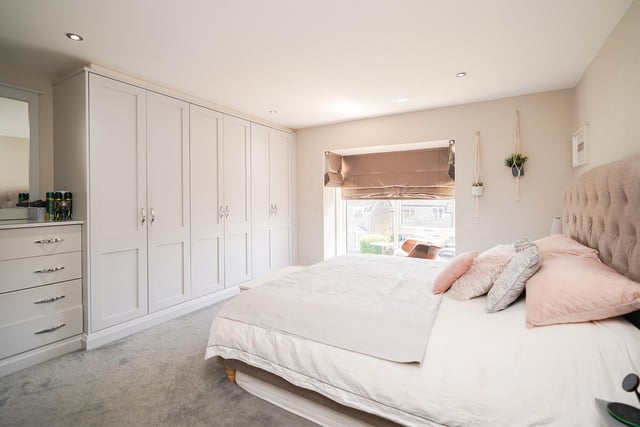 Three of the house's bedrooms have their own bespoke fitted wardrobes.