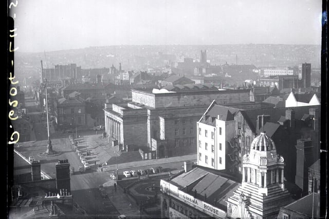 The view towards Sheffield City Hall along Barker's Pool, as seen from the Sheffield Town Hall tower in 1956. Part of the Grand Hotel can be seen, along with Cinema House and the Royal Hospital (top left)