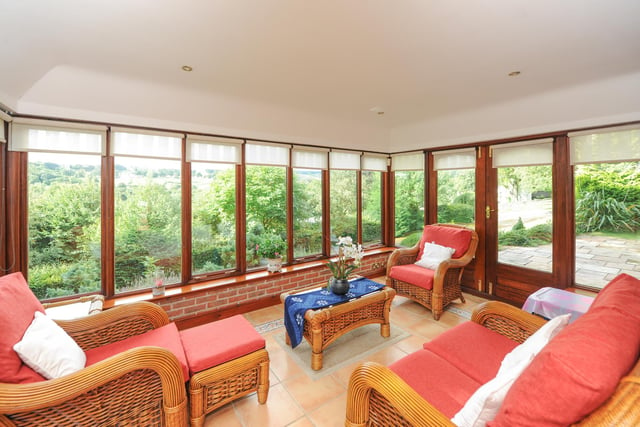 The conservatory/sun room has far-reaching views and patio doors to the garden.
