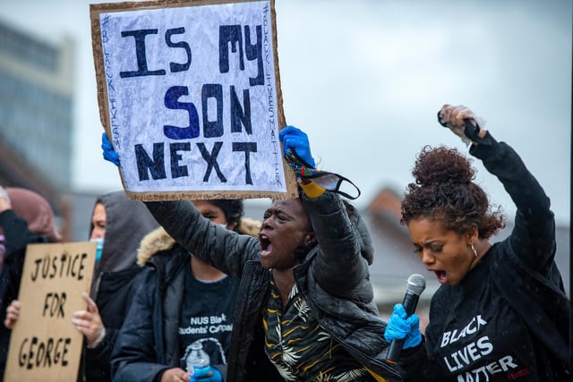 A protester holds up a sign which asks 'Is My Son Next'