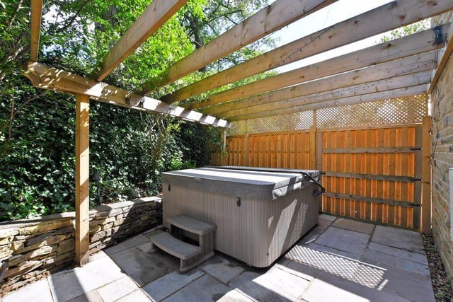 There's space for a luxurious hot tub at the side of the house.
