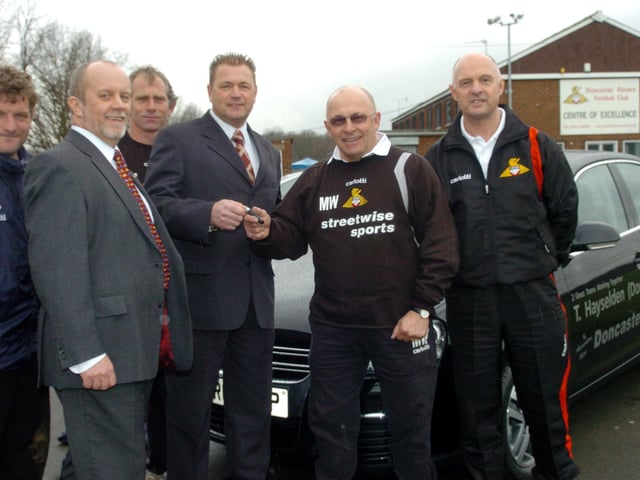 Hayseldens Doncaster District presented Doncaster Rovers with 5 VW cars at their training ground in Doncaster in 2006. L-R= Mickey Lewis(1st team coach) Steve Wragg (Fleet sales manager), Paul Wilson (Youth Worker Manager), Kev Laughton (General Manager of Hayseldens) Mickey Walker (Assistant Manager(DR)) and Barrie Windle (Physio)