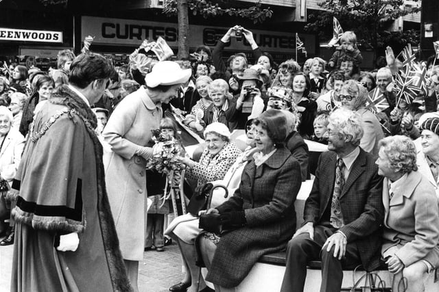 Queen Elizabeth II on walkabout in Middleton Grange shopping centre in 1977.