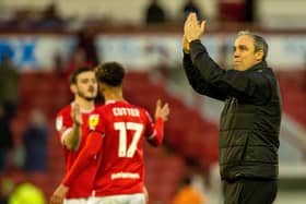Michael Duff applauds the Reds fans at full time after Barnsley beat Cambirdge United 2-0 (Picture: Bruce Rollinson)