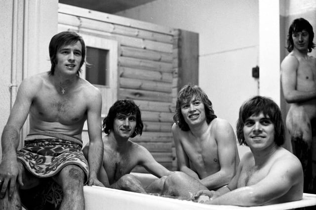 Hibs football players Jim Black and Alex Edwards share a bath after a training session in December 1972. Waiting for their turn Eric Schaedler (far left) & Alex Cropley (2nd right)