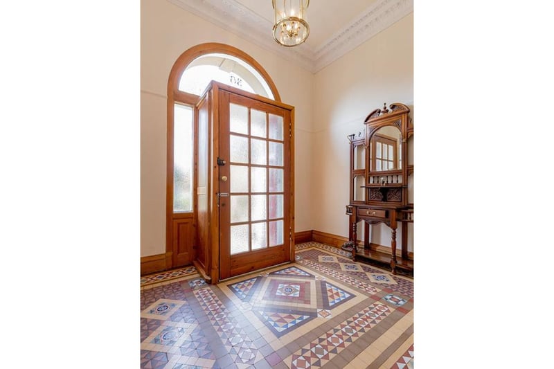Entrance hall with Victorian terrazzo floor tiling.