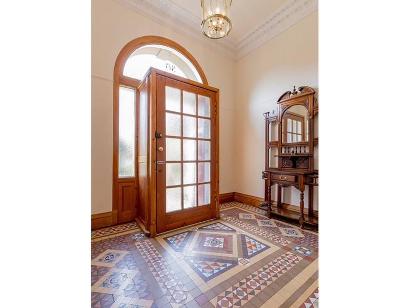 Entrance hall with Victorian terrazzo floor tiling.