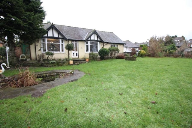 This £425,000 property in Glossop features four bedrooms and a sizeable plot of land to boot.